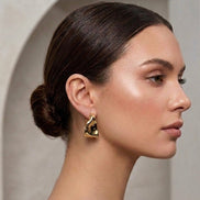 Aretes Kraft